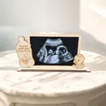 Kornizë për ekon e bebit punim ne dru