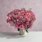 Buqetë elegante me trëndafila rozë, ideale për dhuratë